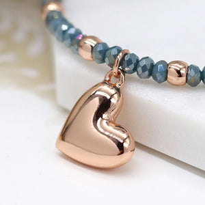 POM Blue beaded bracelet with rose gold heart charm