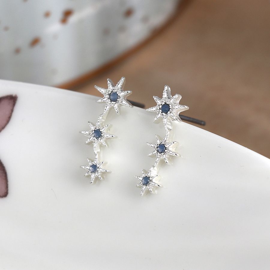 POM Silver triple embossed star and blue crystal stud earrings