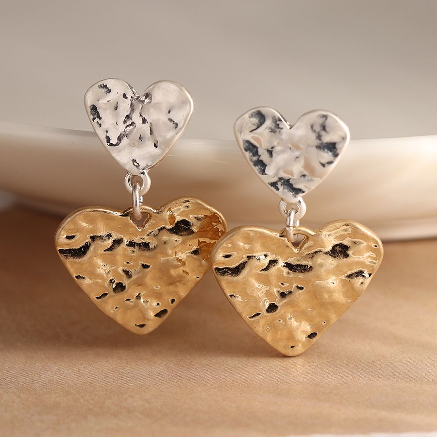 POM Double beaten heart earrings in gold and silver