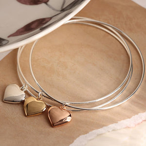 POM Silver plated triple bangle with large mixed metallic hearts