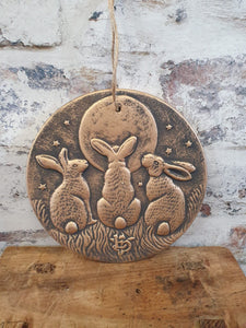 Moon shadows bronze hares plaque garden decoration