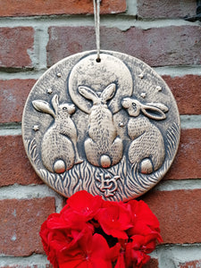 Moon shadows bronze hares plaque garden decoration