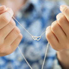Load image into Gallery viewer, Lisa Angel Tiny Interlocking Hearts necklace in silver